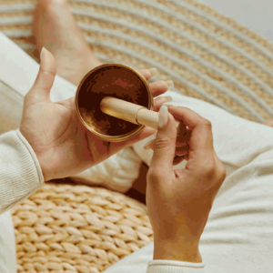 top-view-of-woman-using-singing-bowl-in-sound-heal-2023-10-18-01-00-36-utc